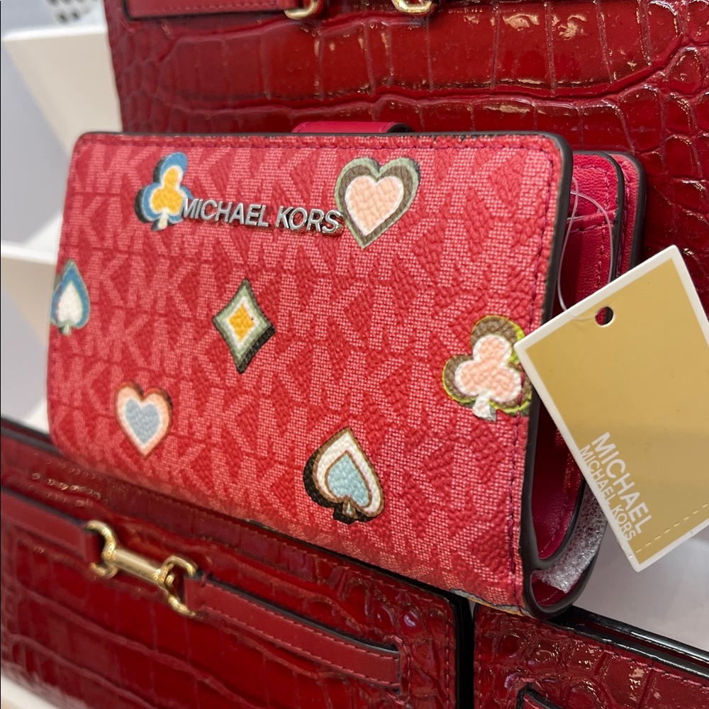 MICHAEL KORS Jet Set Md Printed Signature Logo Bifold Wallet
Dark Raspberry 
NWT - Picture 11 of 16
